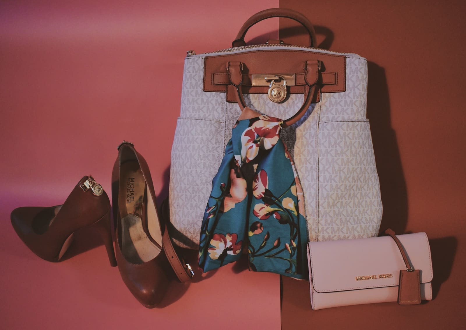black white and red Michael Kors floral handbag