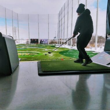 teacher playing topgolf during daytmie
